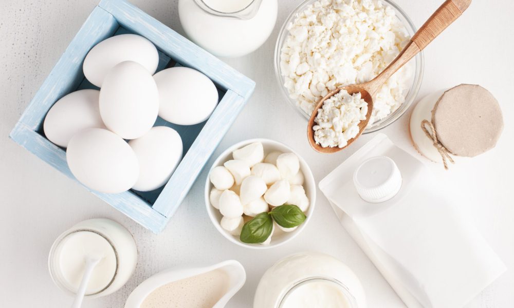top-view-dairy-products-with-eggs-box